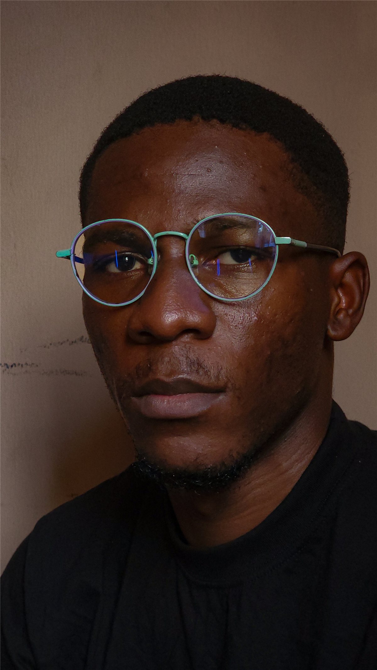 Editorial portrait of Dr. Tolulope Ajidahun